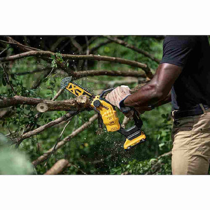 DeWalt DCCS623B 20V MAX XR 8 inch Brushless Cordless Pruning Chainsaw (Tool Only) showing in use cutting through tree branches