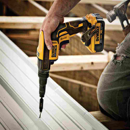 DeWalt DCF622B 20V MAX XR Cordless Versa-Clutch Adjustable Torque Screw Gun (Tool Only) showing screwing corrugated metal for roofing