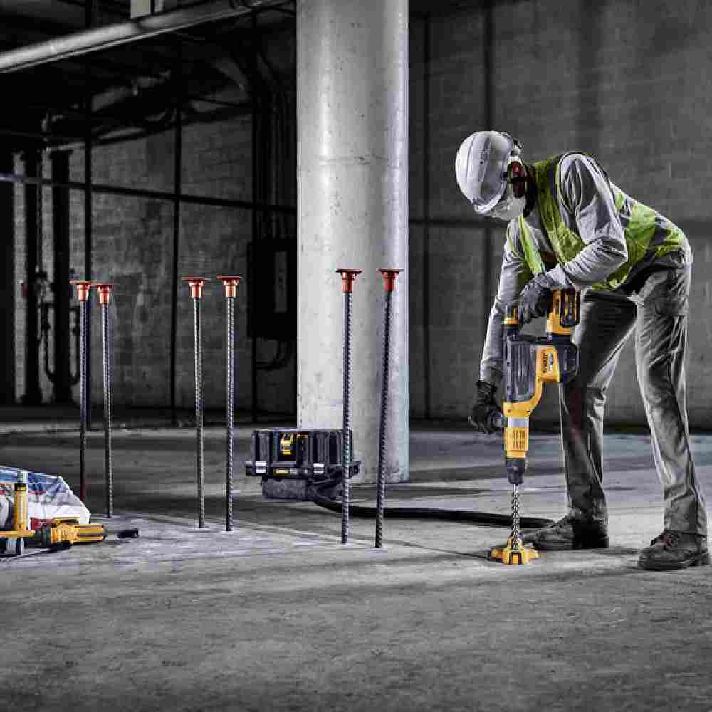 DeWalt DCH775X2 60V MAX Cordless Brushless 2 inch SDS Max Combination Rotary Hammer Drill Kit showing vertical drilling into concrete