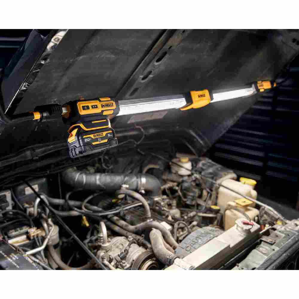 DeWalt DCL045B 12V/20V MAX Cordless Hood Light showing in use lightening up a vehicle motor cavity