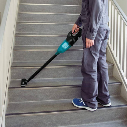 Makita DCL180ZB 18V LXT Cordless Stick Vacuum Cleaner (Tool Only) showing vacuum in use cleaning car seat clean