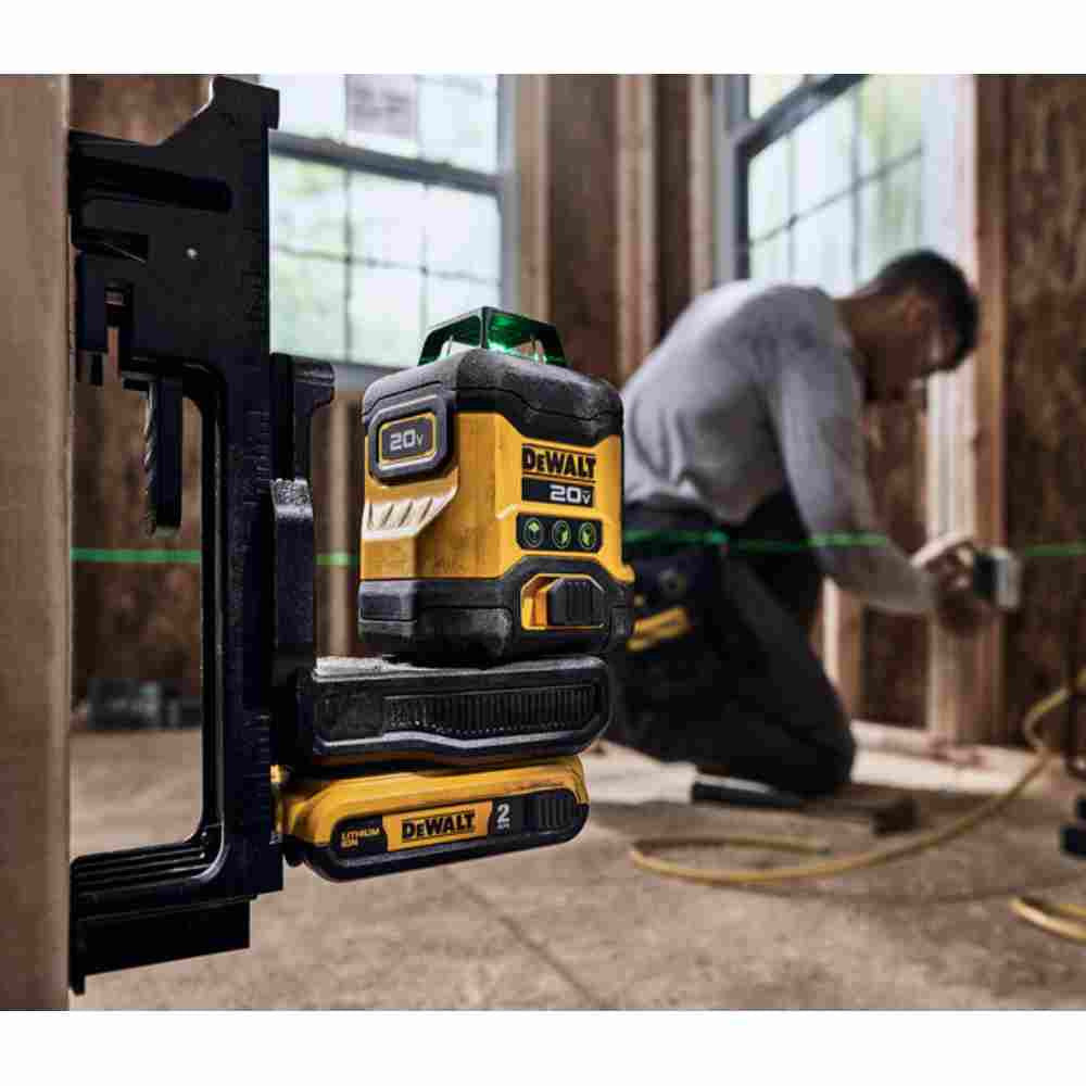 DeWalt DCLE34031D1 20V MAX 3 x 360 degree Green Line Laser Kit showing in use with included bracket to level electrical boxes on wood studs