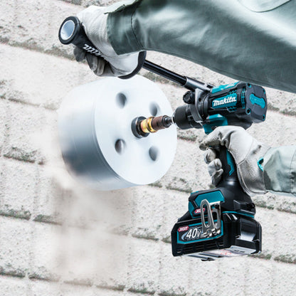 Makita DF001GZ 40V XGT Cordless Brushless 1/2 inch Drill / Driver (Tool Only) showing in use drilling a hole in faux stone with a large hole saw (Hole saw sold separately)
