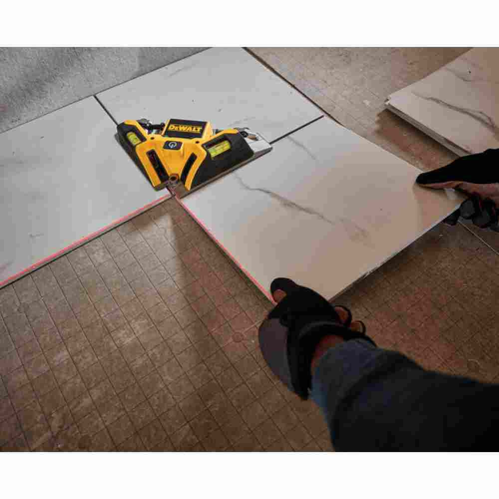 DeWalt DW0802 33' Laser Square showing in use levelling and squaring tiles during floor installation