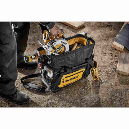 DeWalt DWST560104 20 inch Professional Open Mouth Tool Bag showing with tools loaded in bag on jobsite (Tools sold separately)