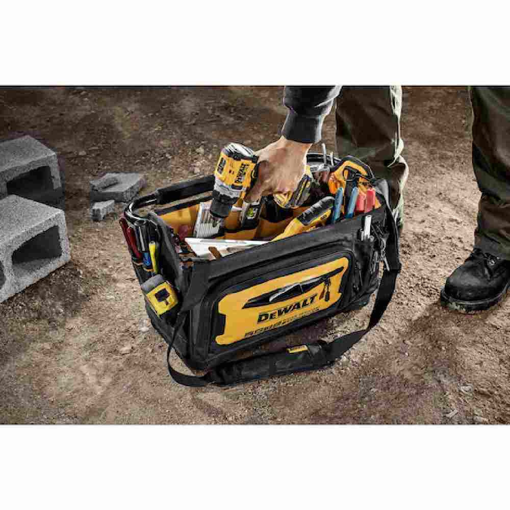 DeWalt DWST560106 20 inch Professional Tool Tote showing with tools loaded in bag on jobsite (Tools sold separately)