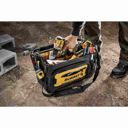 DeWalt DWST560106 20 inch Professional Tool Tote showing with tools loaded in bag on jobsite (Tools sold separately)