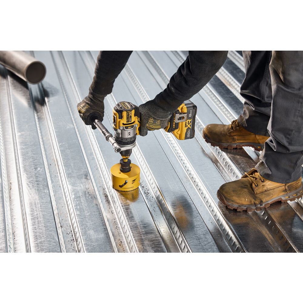 DeWalt DCD1007B 20V MAX XR Cordless Brushless 1/2 Inch 3-Speed Hammer Drill (Tool Only) showing in use drilling into corrugated metal roofing
