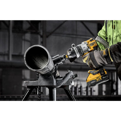 DeWalt DCD1007B 20V MAX XR Cordless Brushless 1/2 Inch 3-Speed Hammer Drill (Tool Only) showing in use drilling a hole into a steel pipe