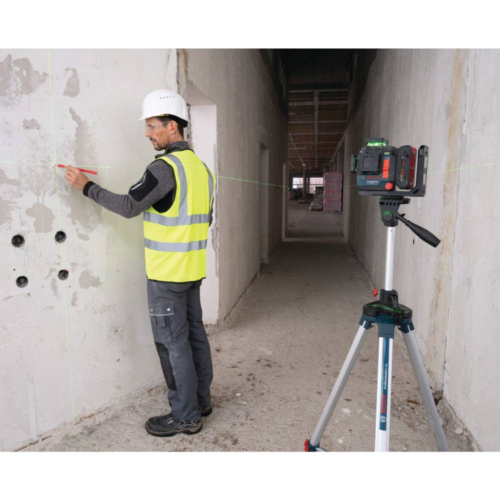 Bosch GLL330-80CGN 18V 360 Degree Green-Beam Three-Plane Leveling & Alignment Laser (Tool Only) showing in use marking points on a wall (Battery sold separately)