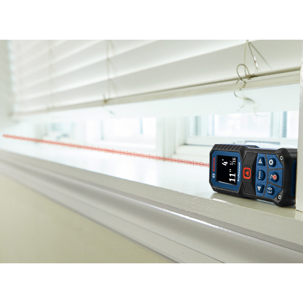 Bosch GLM165-22 BLAZE 165 feet Laser Measure showing in use measuring the opening of a window