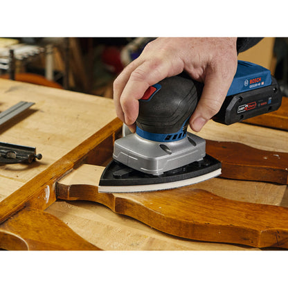 Bosch GSS18V-40N 18V Cordless Brushless Sheet Orbital Finishing Sander (Tool Only) showing in use sanding spindles on a table