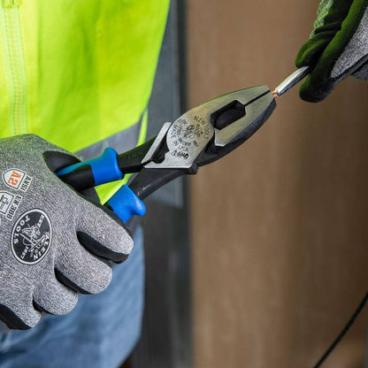 Klein Tools J2000-9NECRTP 2000 Series 9-1/2 inch Lineman's Side-Cutting Pliers showing in use pinching stripped wire ends