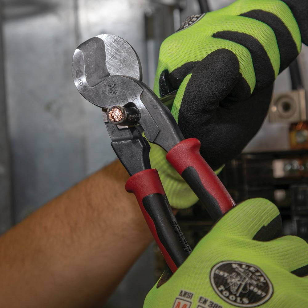 Klein Tools J63225N Journeyman High Leverage Cable Cutter with Stripping showing in use cutting wires