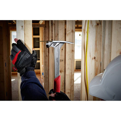 Milwaukee 48-22-9017 17oz Smooth Face Framing Hammer showing in use nail starter to drive nil into wood stud