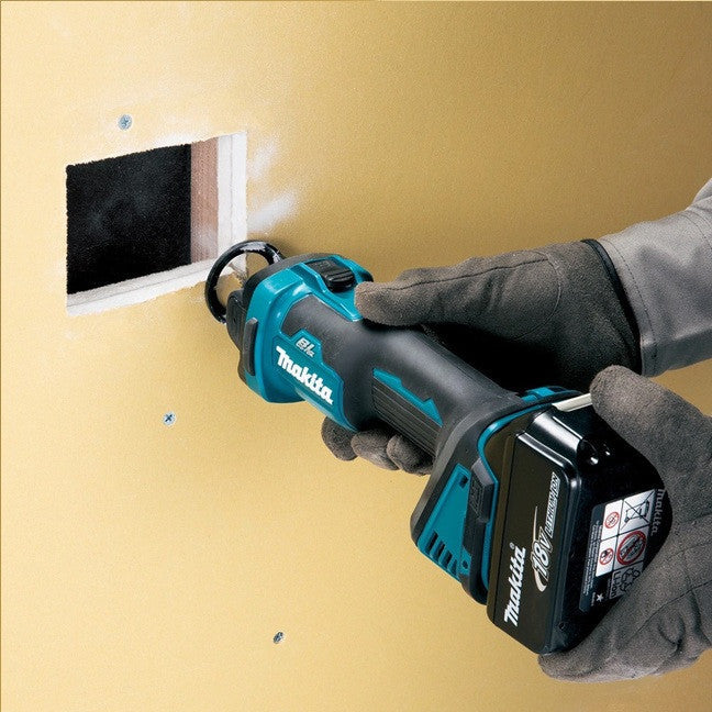 Makita DCO181Z 18V Drywall Cut-Out Tool cutting drywall (battery sold separately)
