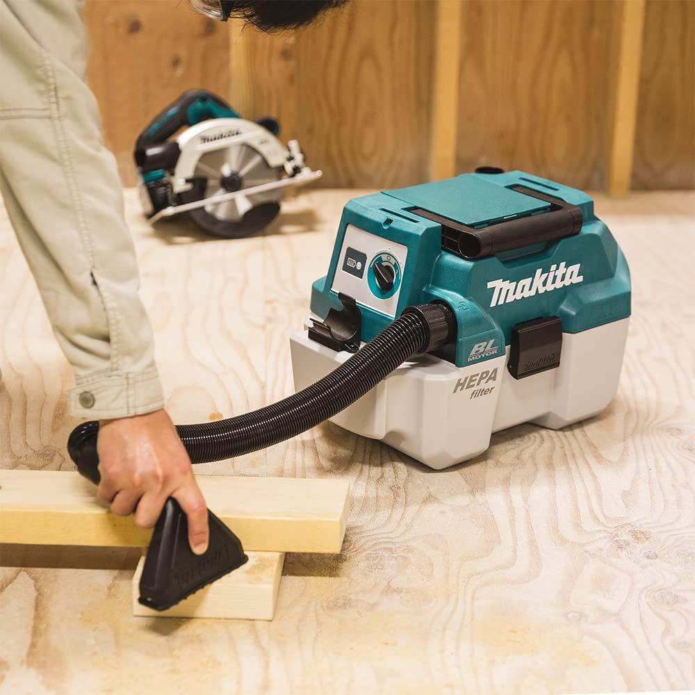 Makita DVC750LZ 18V 7.5L Portable Wet/Dry Vacuum Cleaner vacuuming (battery sold separately)