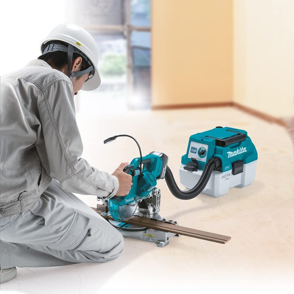 Makita DVC750LZ 18V 7.5L Portable Wet/Dry Vacuum Cleaner vacuuming (battery sold separately)