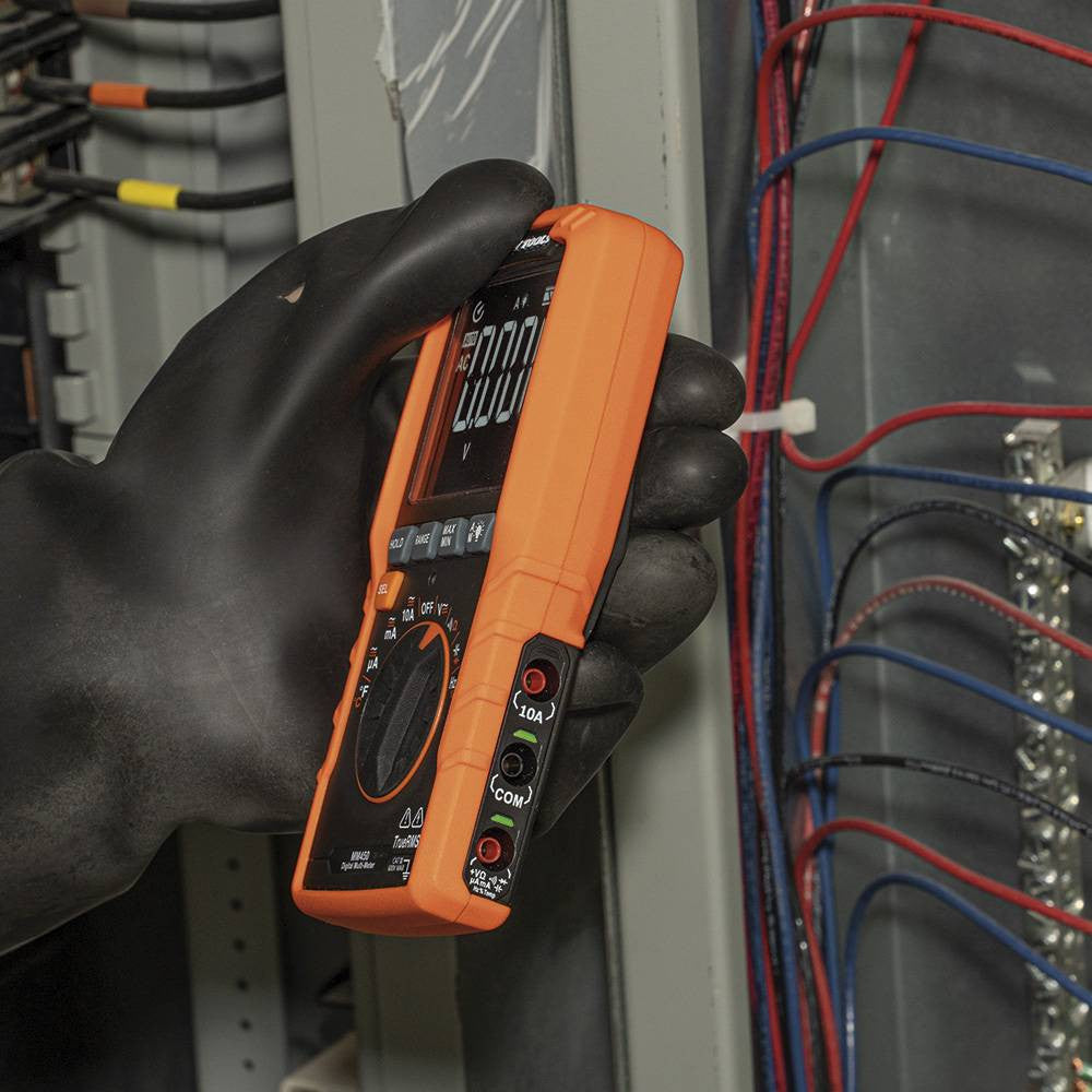 Klein Tools MM450 600V TRMS Auto-Ranging Slim Digital Multimeter showing in use testing voltage with leads