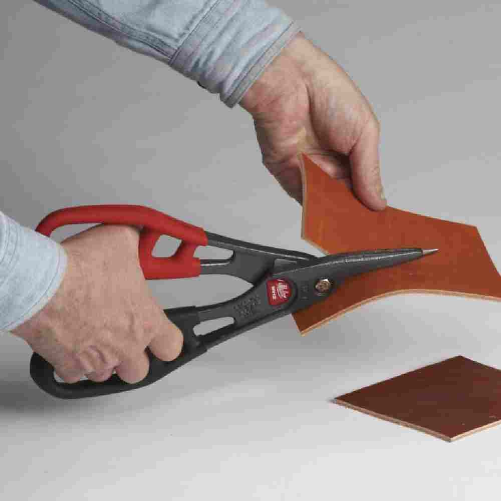 Malco MV12 12 inch Andy Combination Snips showing cutting leather sheet