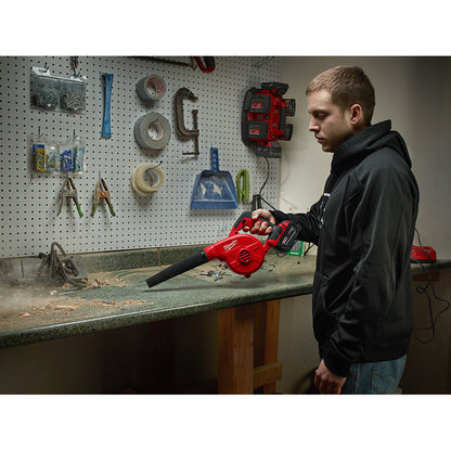 Milwaukee 0884-20 M18 Compact Blower (Tool Only) cleaning up a workbench (battery not included)