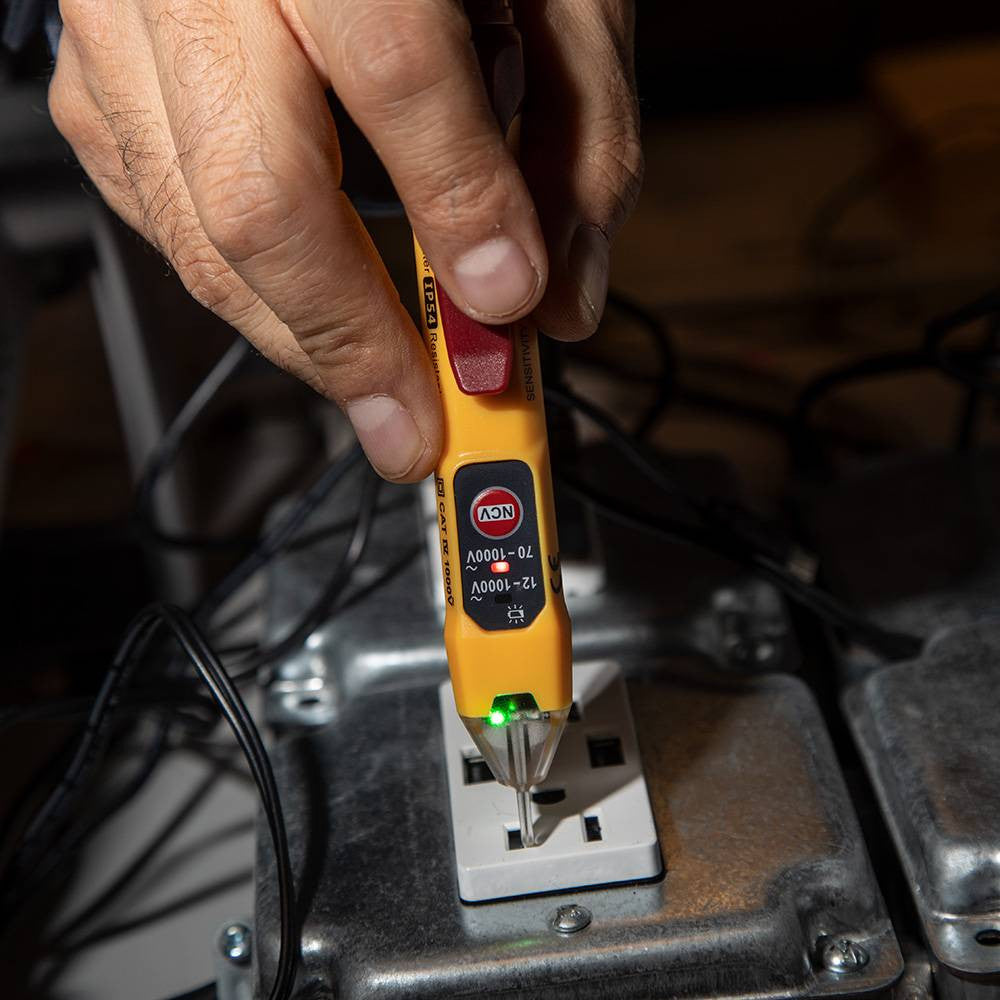 Klein Tools NCVT2PKIT Dual Range NCVT with Receptacle Tester Electrical Test Kit showing in use testing electrical outlet