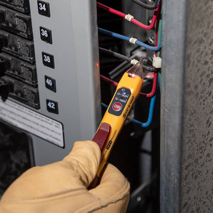 Klein Tools NCVT2PKIT Dual Range NCVT with Receptacle Tester Electrical Test Kit showing in use testing wires coming out off breaker panel