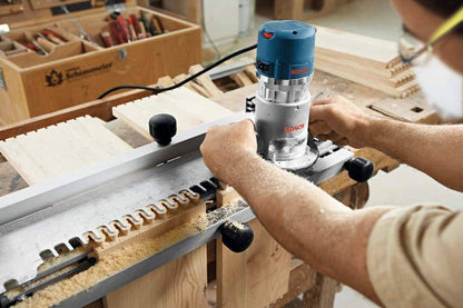 Bosch 1617EVS 2-1/4 HP Electronic Fixed-Base Router cutting out shapes