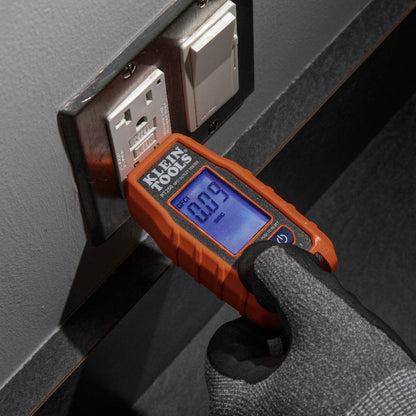 Klein Tools RT250 GFCI Receptacle Tester with LCD showing in use testing an interior electrical outlet