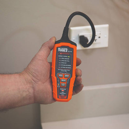 Klein Tools RT310 AFCI/GFCI Outlet Tester showing in use
testing interior outlet