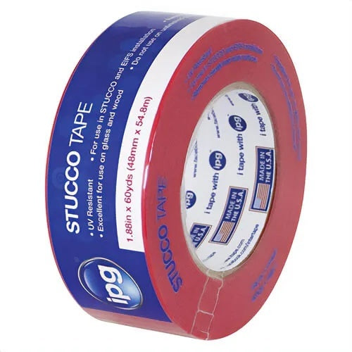 A roll of Stucco Tape by IPG, featuring a blue outer band with white text and a red inner band, on a clean white background.