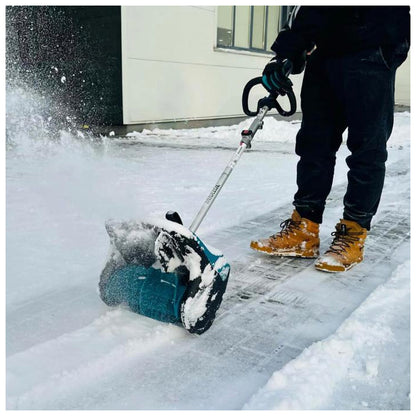 Makita SN400MP attachment clearing an icy walkway