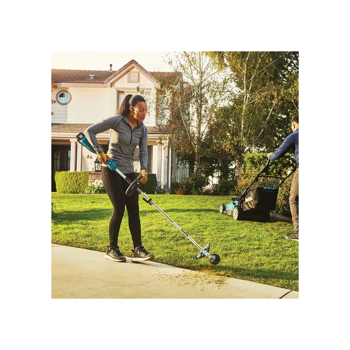 Makita DUX18Z power unit operating an edger attachment