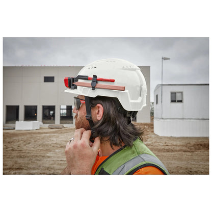 Milwaukee BOLT white vented safety helmet worn on a jobsite