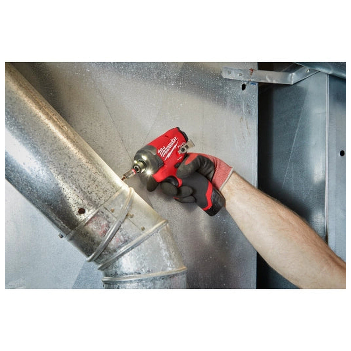 Milwaukee 3453-21 M12 FUEL impact driver used for overhead HVAC fastening