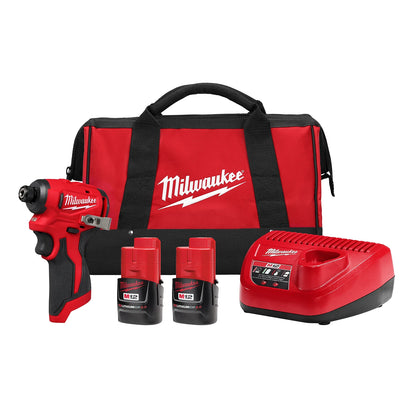 Image of an M12™ Subcompact Brushless 1/4" Hex Impact Driver Kit that includes a cordless impact driver, a charger, two M12 lithium-ion batteries, and a red and black carrying bag with the Milwaukee logo. The tool and accessories are positioned in front of the bag.