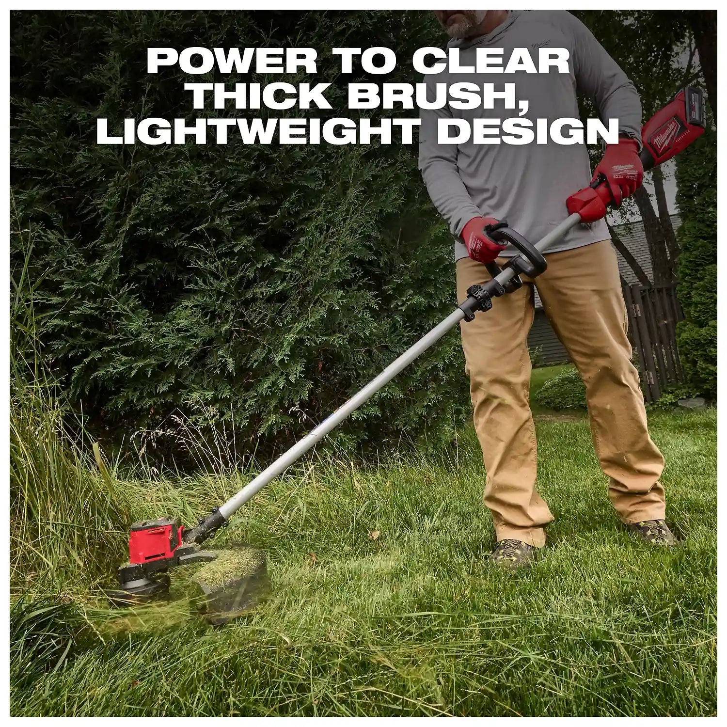 A man uses the M18 Brushless String Trimmer to cut grass in a yard. The tool features a red and black design, with text indicating its power to clear thick brush and a lightweight design.