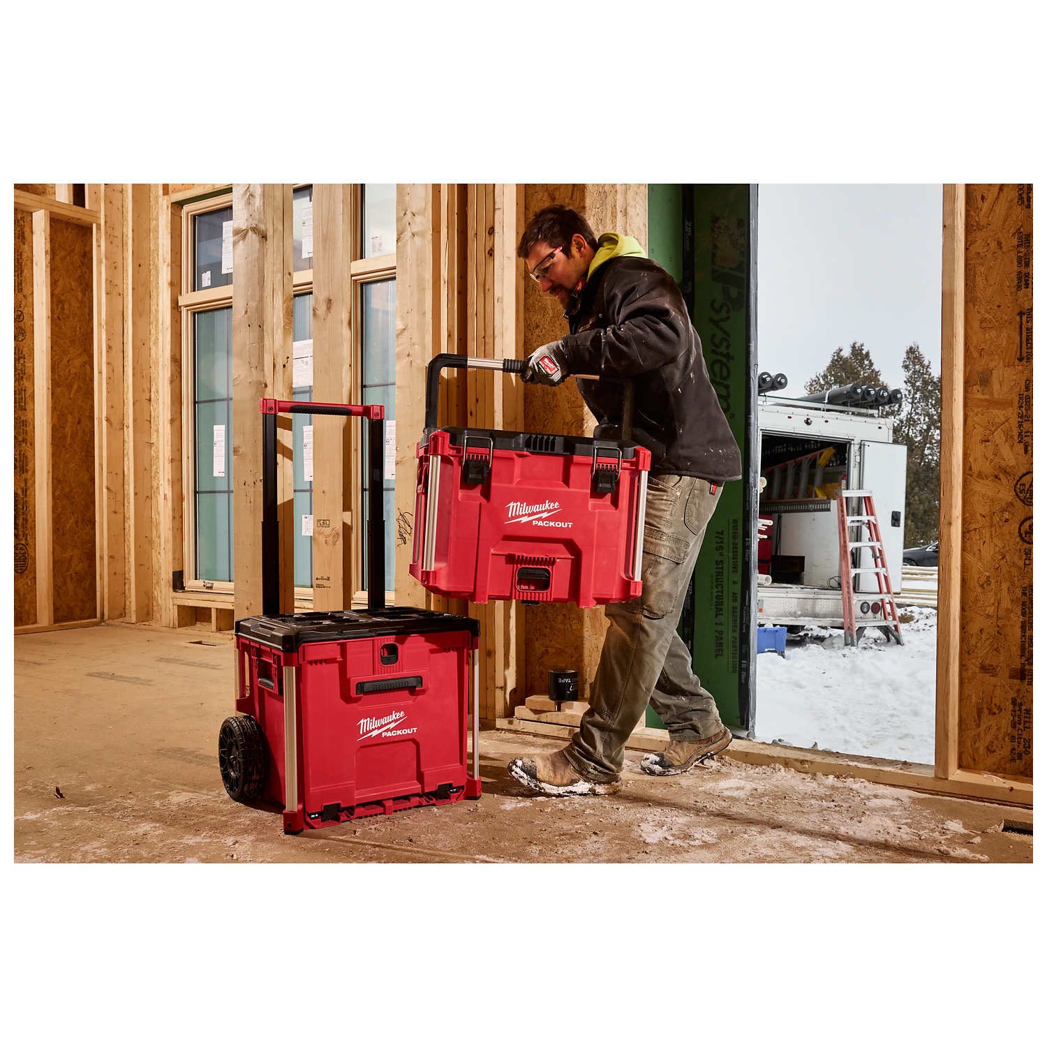 Milwaukee PACKOUT XL Tool Box carried on a jobsite