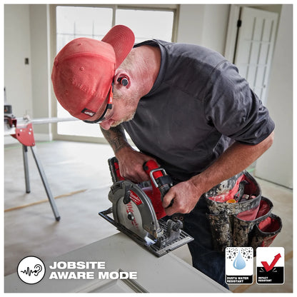 Worker on the jobsite wearing the Bluetooth ear buds while using a Milwaukee circular saw