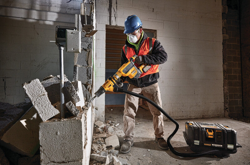 DeWalt DCH614X2 60V MAX Cordless Brushless SDS MAX 1-3/4 inch Combination Rotary Hammer Kit showing in use chipping and breaking down a concrete wall